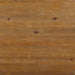 Top-down close up distressed oak plank tabletop finish of rustic coffee table.
