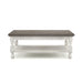 Front facing transitional one-shelf antique white and gray wood coffee table on a white background