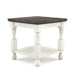 Front facing corner view of a transitional one-shelf antique white and gray wood end table on a white background