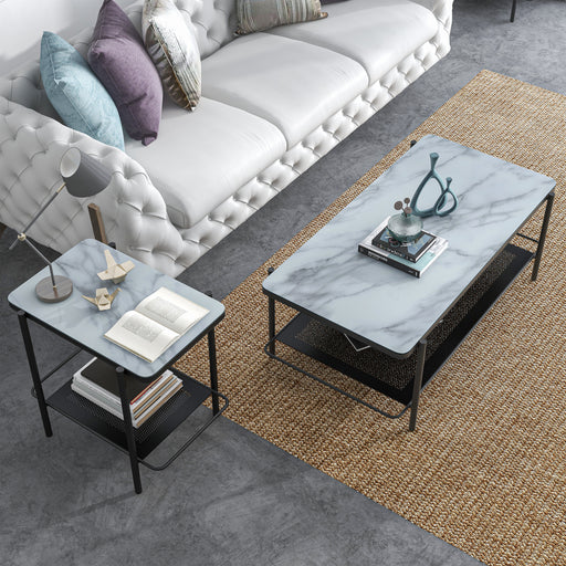Right angled top view modern industrial black steel coffee table and left-facing black steel end table with tempered white marble glass tops, perforated open metal shelves, and decor in a living room.