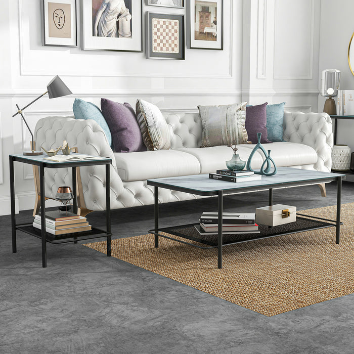 Right angled modern industrial black steel coffee table and left-facing black steel end table with tempered white marble glass tops, perforated open metal shelves, and decor in a living room.