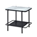 Left angled modern industrial black steel end table with tempered white marble glass top, slender steel legs and perforated open metal shelf on a white background.