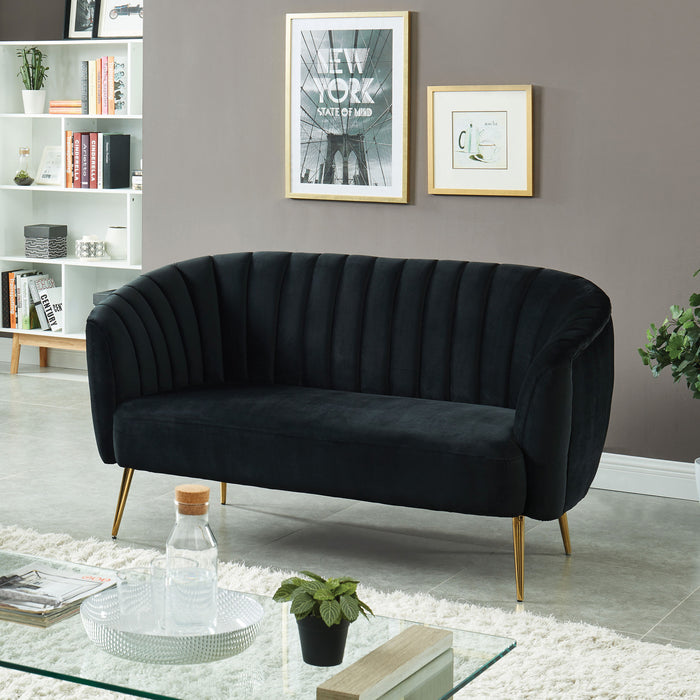 Left-angled modern glam shell tufted loveseat with black upholstery and gold finish legs in a contemporary living room with accessories