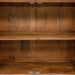 Front-facing close up modern farmhouse rustic wood storage cabinet interior with shelves and magnetic door closures