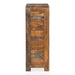 Front facing side view of a rustic natural mango wood five-drawer accent chest on a white background