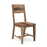 Angled view of one of two natural tone mango wood rustic dining chairs on a white background
