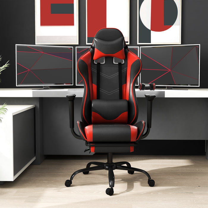 Front-facing view of contemporary red and black faux leather and metal gaming chair in work space with furnishings and accessories