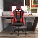 Back-facing view of contemporary red and black faux leather and metal gaming chair with furnishings and accessories