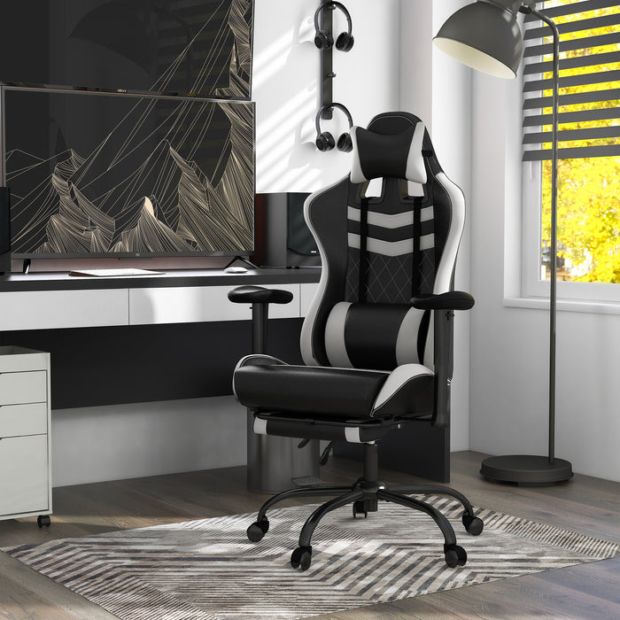 Angled view of contemporary white and black faux leather and metal gaming chair in work space with furnishings and accessories