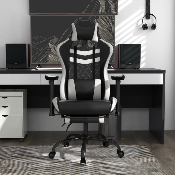 Front-facing view of contemporary white and black faux leather and metal gaming chair in work space with furnishings and accessories