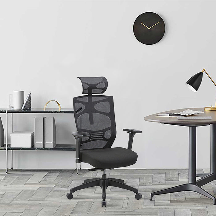Right angled contemporary black adjustable office chair with headrest in an office with accessories