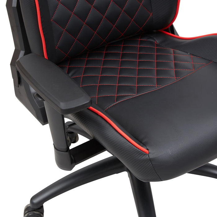 Right angled seat and back diamond quilting close up view of a race car-inspired black and red faux leather gaming chair on a white background