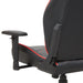 Left angled back and armrest close up view of a race car-inspired black and red faux leather gaming chair on a white background