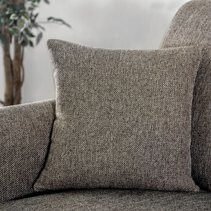 Front-facing view of accent pillow and edge of transitional brown poly fabric upholstered loveseat.