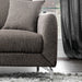 Front-facing view of accent pillow and track arm of transitional brown poly fabric upholstered loveseat.