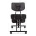 Front-facing back view modern black ergonomic kneeling chair with wheels on a white background