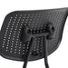 Right angled close up modern gray ergonomic kneeling chair perforated seat back detail on a white background
