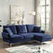 Right angled contemporary modular navy blue chenille sectional sofa in a living room with accessories