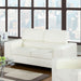 Left angled contemporary white faux leather sofa in living room with accessories.