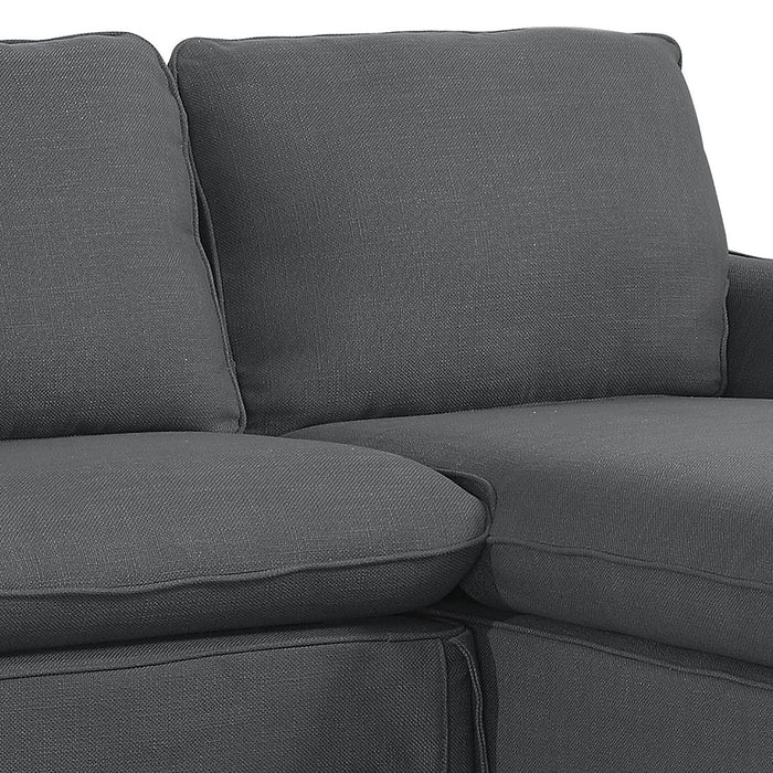 Right-angled close up transitional sectional sofa plush seat and back cushion detail on a white background