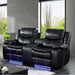 Left angled view of black breathable faux leather two-seat recliner loveseat in living space.