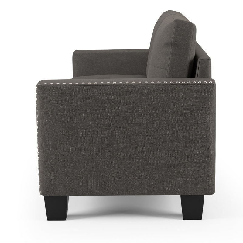 Side-facing view of modern gray fabric sofa on white background.