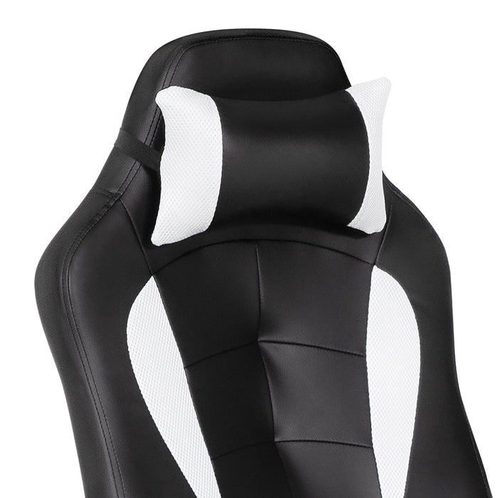 Right angled back and headrest close up view of a contemporary black and white faux leather gaming chair on a white background