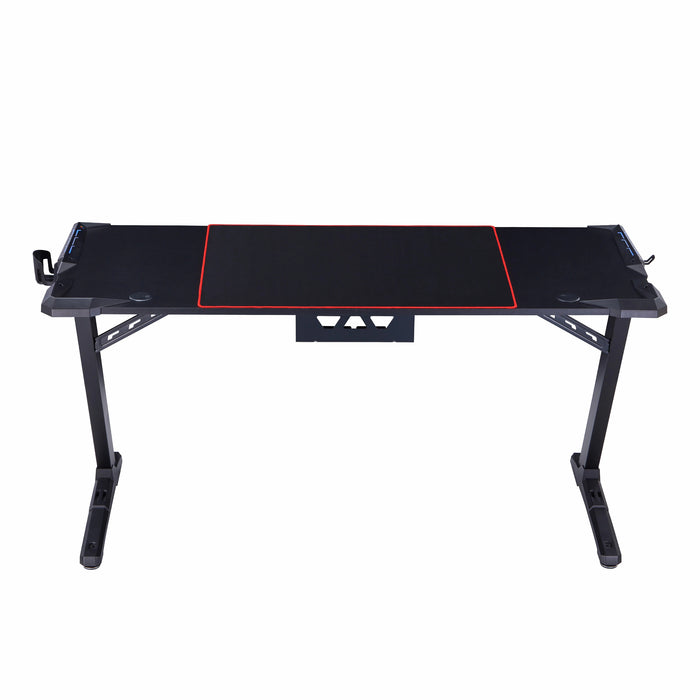 Front facing contemporary black gaming desk with red accents on a white background