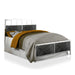 Right-angled modern glam black and chrome bed with wave headboard details and linens on a white background