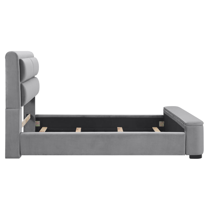 Front-facing side view of a modern glam gray upholstered bed on a white background