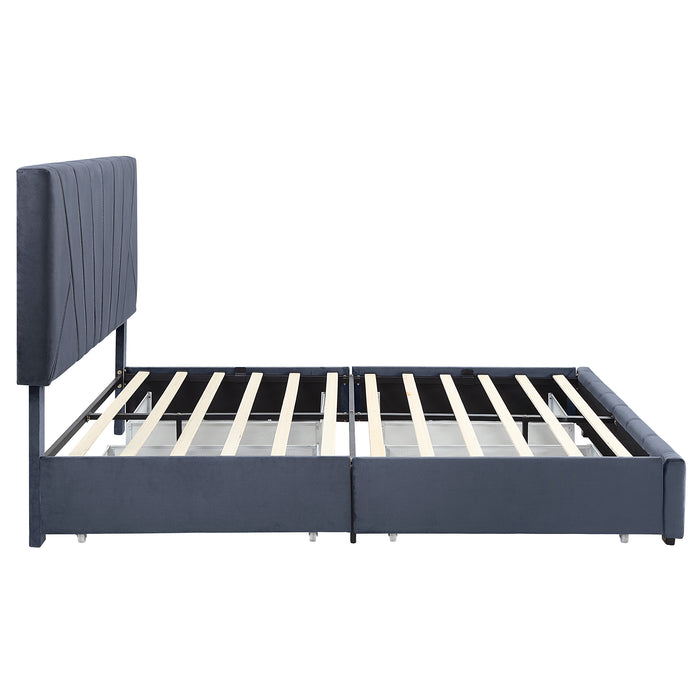 Front-facing side view of a modern glam gray upholstered storage bed with radiant channel tufting and underbed drawers on a white background