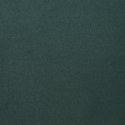Swatch of velvet-like dark green fabric of a modern glam upholstered storage bed