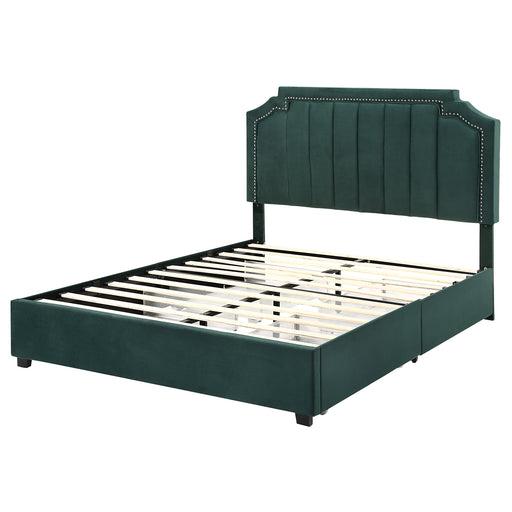 Left-angled modern glam dark green upholstered storage bed with nailhead trim and underbed drawers on a white background