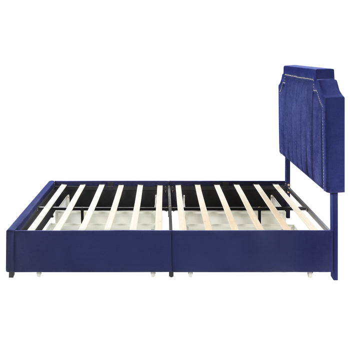 Front-facing side view of a modern glam navy blue upholstered storage bed with nailhead trim and underbed drawers on a white background