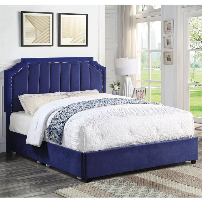 Right-angled modern glam navy blue upholstered storage bed with nailhead trim and underbed drawers in a stylish bedroom with linens and accessories