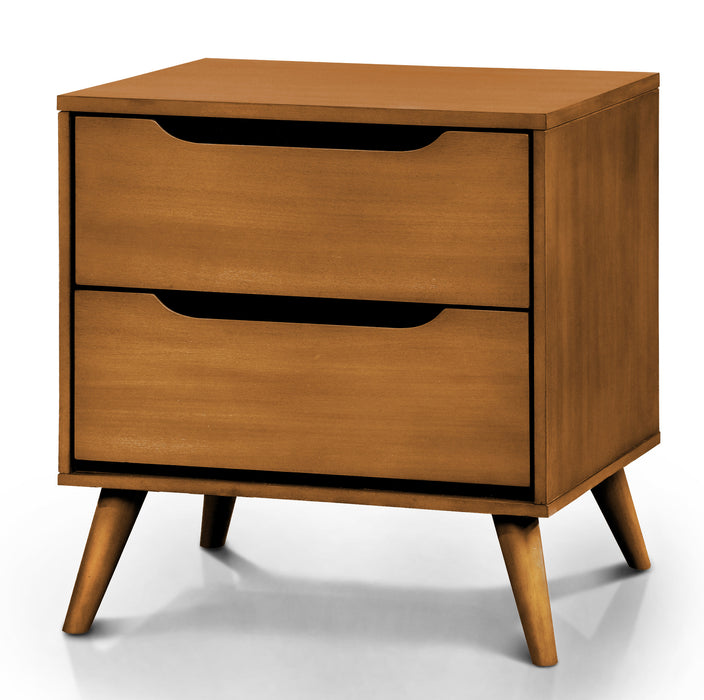 Front-facing of the tapered and splayed feet of an oak finished mid-century modern style nightstand against a white background.