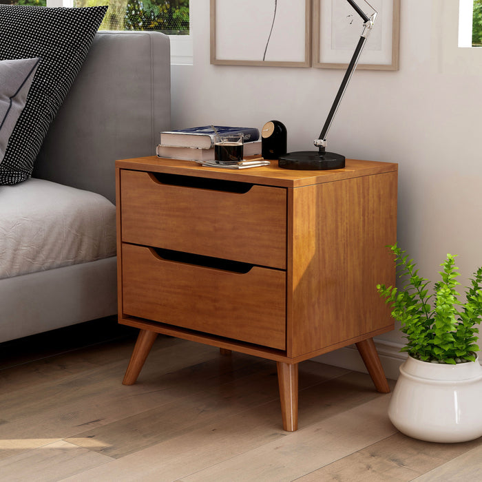 Left-angled oak finished mid-century modern style nightstand against a white background. Two drawers with grooved handles sit on tapered and splayed feet.
