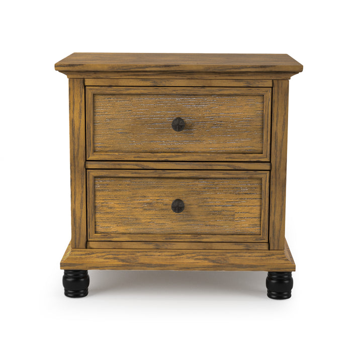 Front-facing oak 2-drawer nightstand against a white background. The traditional style design is embellished with knob pulls and black cylindrical feet.