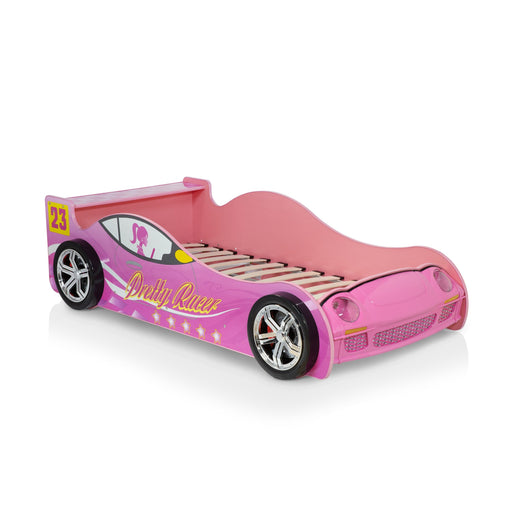 Right-facing novelty style pink car shape twin bed on white background. Polished hubcaps, lifelike wheels and headlights. Back shelf for books and toys.