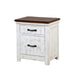 Left-angled white wood grain nightstand with two drawers and a contrasting dark wood top on a white background
