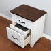 Left-angled top view white wood grain nightstand with hidden and lower drawers open and a contrasting dark wood top on a white background