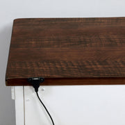 Front-facing back view close up white wood grain nightstand with a contrasting dark wood top and wire details