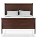 Front-facing transitional cherry finish wooden sleigh bed with linens on a white background