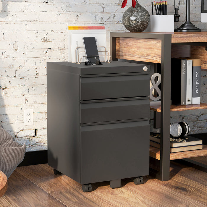 Right angled contemporary three-drawer gunmetal locking file cabinet with wheels in a living space with accessories