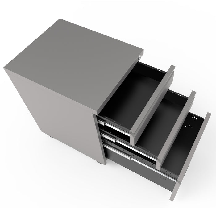 Right angled top view of a contemporary three-drawer silver locking file cabinet with wheels and drawers open on a white background