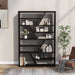 Front-facing contemporary espresso open shelf bookcase with angular accents as a room divider with accessories