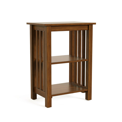 Right angled mission style solid wood two-shelf end table in antique oak on a white background