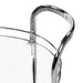 Left angled close up contemporary chrome and tempered glass serving cart with two shelves handle detail on a white background