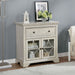 Right angled traditional antique white one-drawer hallway cabinet in a living area with accessories