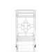 Front-facing side view contemporary chrome and tempered glass serving cart with quatrefoil accents on a white background